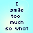Pixelated text displays 'I smile too much so what' in dark blue on light blue background, arranged in two identical vertical with slight spacing between them