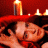 A split-frame animated contact sheet showing a person in red attire with candles on the left and green text reading "Original Icons .com" on the right, both rendered in low-resolution pixel art style.