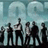 A pixelated image shows a group of figures in front of a cloudy sky, with a bright green background containing red text reading '106t' and 'PUZ!' in the right section.