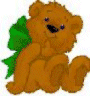 Animated sequence of teddy bears in various poses holding hearts or bows, with color variations including brown, gray, white, and purple.