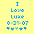Blue pixelated text on yellow background reads 'I Love Luke 8-31-07' with five star icons below, one light blue and four dark blue.