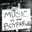 Static pixelated image with text "MUSIC IS MY BOYFRIEND" on a white background, surrounded by dark gray and black abstract shapes.