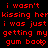 Red pixelated text repeats across a black background with a gray rectangle in the bottom-right corner.
