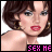 Pixelated close-up of a woman with short dark brown hair, red lips, and gold earrings against a white background with pink text.
