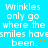 A static image with a bright blue background displaying repeated text and orange heart symbols.