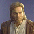 Static pixelated image of a person with light brown hair and beard wearing a white shirt under a dark jacket against a blue background.