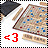 A pixelated image of a triangular board game piece with blue and red dots, flanked by two black-and-white striped objects on white background.