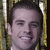 A pixelated image shows a person with short dark hair against a golden patterned background, next to bold red text reading FISH! on a white field.