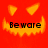 Red background with yellow triangular eyes and jagged mouth; black text 'Beware' centered below the mouth in pixelated font.