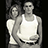 Black-and-white pixelated image of two people in a close embrace, with text reading "boys are like public restrooms either taken or full of shit" in light green pixel font.