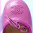 A 2x2 contact sheet of a pink Chanel-themed animated icon showing a close-up of a pink shoe with the Chanel logo, text elements, and partial face view.