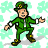 Animated pixel art of a green-clad leprechaun dancing against a light green clover background with subtle shadow effects.