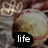Two side-by-side pixelated images of a light brown rounded object with dark red accents, each featuring text on black rectangular backgrounds.