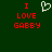 Green background with red pixelated text 'I LOVE GABBY' and a white heart symbol above the left side of the text.