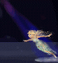 Animated sequence of a female figure in a light blue dress performing dynamic dance moves against a dark background with purple stage lights.