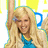 Pixelated image of a smiling blonde woman with long hair, wearing a blue top and white jacket, against a yellow background with blue text.