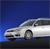 Pixelated white sedan viewed from side against solid blue background with dark lower ground strip