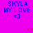 Pixelated text and symbols on a bright pink background with blue and red elements.