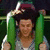 A pixelated image shows a person with dark hair holding green objects above their head, next to green text reading "How could you not love that face???".