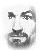 Two grayscale pixelated images of a man's face side-by-side, showing different expressions with visible mouth and eye details.