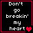 Four identical black square with red borders display white pixelated text 'Don't go breakin' my heart' and a single red heart symbol