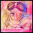 Pixelated anime-style character with flowing hair and colorful background next to stylized text on black background
