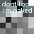 Pixelated grayscale image with repeated text "dont look im naked" in light blue, arranged in two horizontal on a checkered background