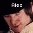 Pixelated image of a person with light skin and brown hair, wearing a white top against black background; text above head changes from 'Alex' to '<3'.