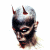Pixelated image of a demonic figure with horns and dark facial markings on white background, next to green text reading OriginalIcons.com.