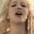 A 3x2 contact sheet of five animated frames showing a woman with blonde hair laughing, displayed in low-resolution pixel art style.