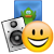 Pixelated static image shows a yellow smiley face, black-and-white speaker icon, and green frog-like figure against blue background.