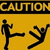 Yellow and black caution sign with two silhouetted figures performing martial arts moves, text reading "CAUTION" and "SPARTA" visible.