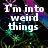 Pixelated text reads "I'm into weird things" over a black background with purple, blue, and green abstract shapes.