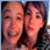 Two people with light skin tones and dark hair appear in a close-up, pixelated image showing partial facial features including eyes, noses, mouths, and cheeks.