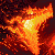 A static pixel art image of a fiery, abstract shape with glowing orange and yellow tones against dark red and black background pixels.