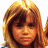 A pixelated image of a person with long light brown hair against a white background, next to green text on dark green.