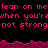 Pixelated text repeats 'lean on me' and 'when you're not strong' in pink against black, with a magenta wave border.