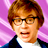 Pixelated static image of a person with brown hair and glasses against a purple background, wearing a dark jacket over a white shirt.
