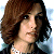 A pixelated image shows a person with brown hair and light skin on the left, next to green text reading "Original Icons .com" on a dark green background.