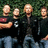 Four pixelated figures stand in a against a green background with the word "Nickelback" in pixelated text to the right