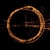 Static pixelated icon of a circular ring with internal geometric shapes on black background