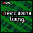 Animated icon with green striped background displaying 'LIFE'S WIRTH Living' text where each letter cycles through rainbow colors while top-left corner icons change color sequences.