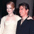 Two people stand side-by-side against a dark background, with green text reading 'Original Icons .com' on the right.