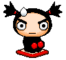 Pixel art character with black pigtails, red hair ties, white hair accessory, large white eyes, black outfit with red circles, red platform shoes, and a neutral expression.