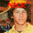 A person with curly brown hair wears a yellow shirt and blue shoulder straps under red text reading NICK, LOVES, or DINA :) across four