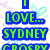 Pixelated green text on blue blocks reads "LOVE... SYDNEY CROSBY" with pastel butterflies and hearts scattered across a white background.