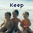 Three children in swimwear pose together on a beach with text above them reading Keep it together.