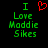 Green pixelated text reads "I Love Maddie Sikes" with a red heart symbol replacing the word 'love' in one view, all on black background.