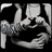 Black-and-white pixelated image of two people embracing, with text overlays changing across frames.