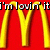 Red background with yellow vertical bars and black-and-white text reading "i'm lovin' it" at the top.